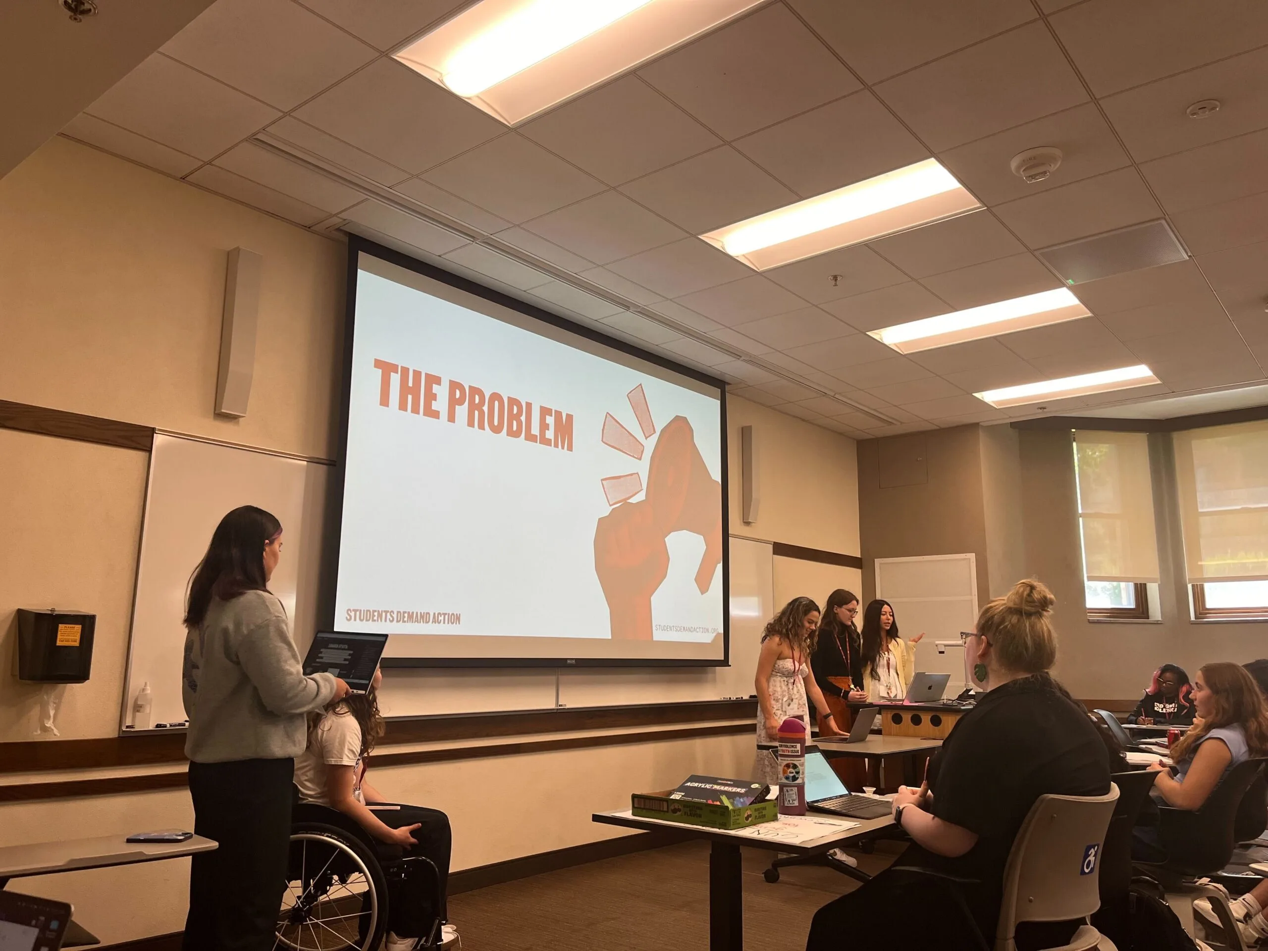 Student attendees at the Students Demand Action Summer Organizing Institute present their capstone project.