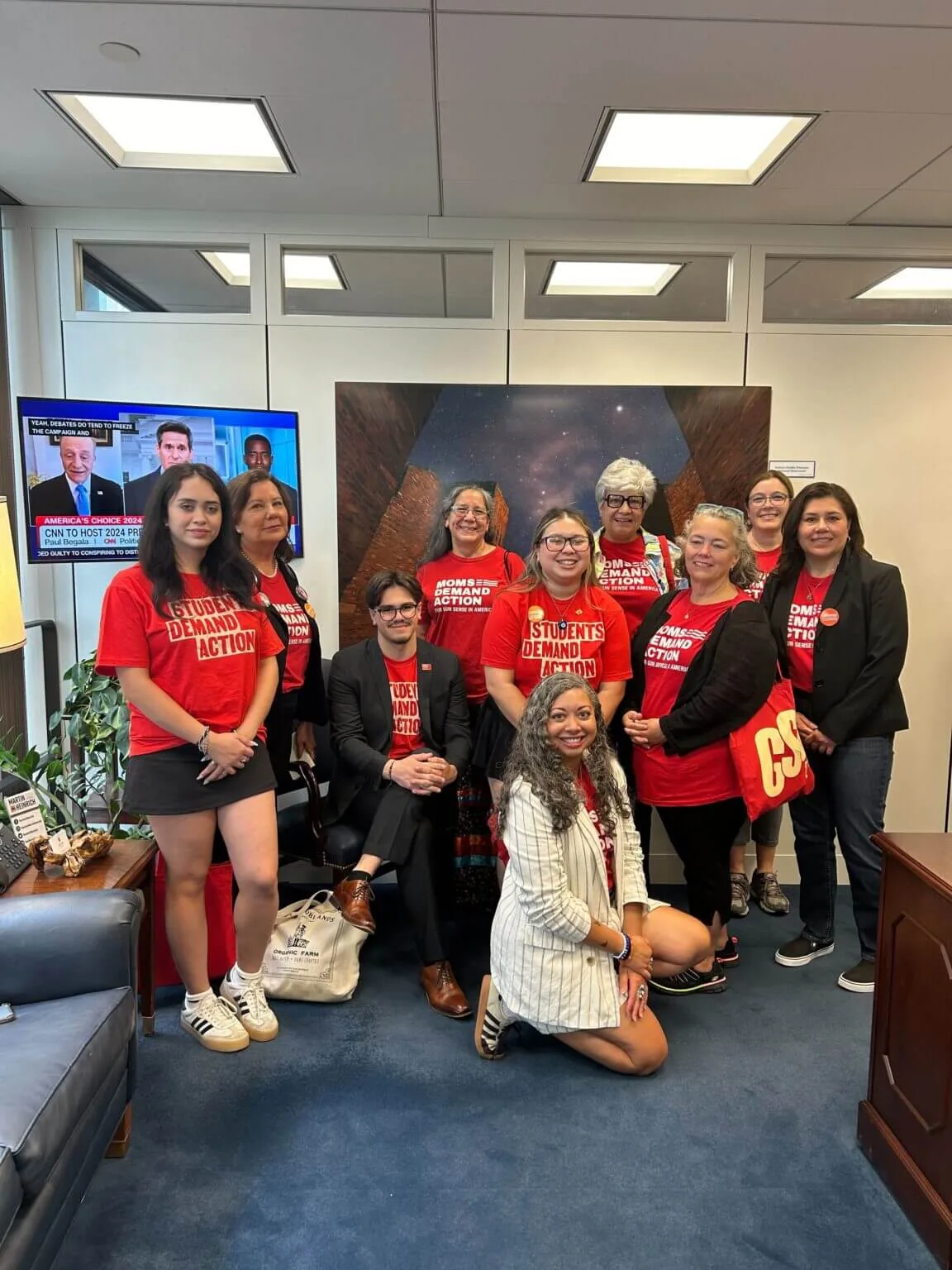 Three Students Demand Action volunteers pose with seven Moms Demand Action volunteers; all are representing the New Mexico chapter during federal advocacy day at Gun Sense University in Washington, D.C.