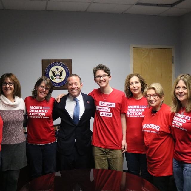 Laurence Fine and volunteers with Moms Demand Action attend a meeting