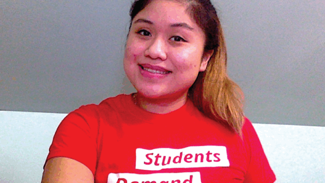 Kathy P. wears a Students Demand Action shirt