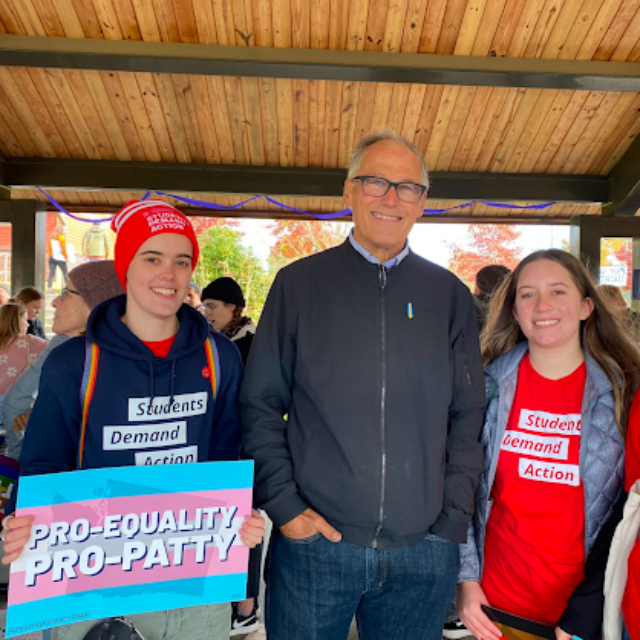 Flynn Williams holding a Pro-Equality, Pro-Patty sign