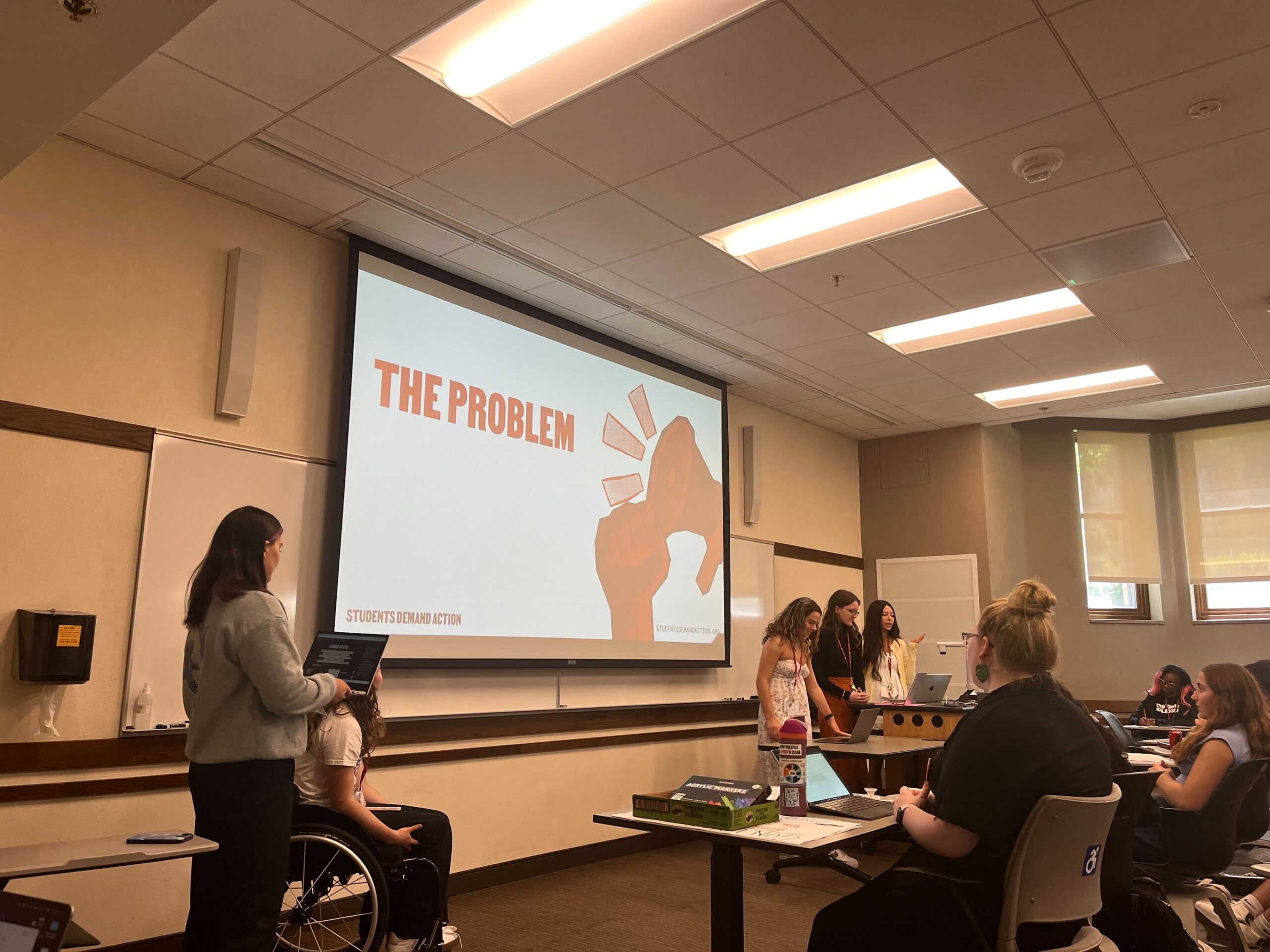 Student attendees at the Students Demand Action Summer Organizing Institute present their capstone project.