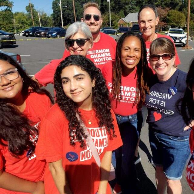 Two Students Demand Action volunteers and five Moms Demand Action volunteers canvass with Angela Ferrell-Zabala during the 2025 election cycle in Virginia.